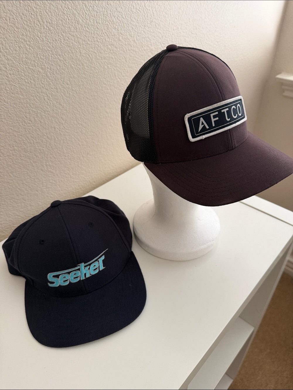 AFTCO Brown Mesh and Seeker Navy Mesh Trucker Hat bundle